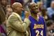 Dec 14, 2014; Minneapolis, MN, USA; Los Angeles Lakers guard Kobe Bryant (24) laughs with head coach Byron Scott during the fourth quarter against the Minnesota Timberwolves at Target Center. The Lakers defeated the Timberwolves 100-94. Mandatory Credit: