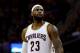 CLEVELAND, OH - DECEMBER 23: LeBron James #23 of the Cleveland Cavaliers looks on in the game against the Minnesota Timberwolves at Quicken Loans Arena on December 23, 2014 in Cleveland, Ohio. NOTE TO USER: User expressly acknowledges and agrees that, by