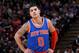 SACRAMENTO, CA - DECEMBER 27: Shane Larkin #0 of the New York Knicks looks on during the game against the Sacramento Kings on December 27, 2014 at Sleep Train Arena in Sacramento, California. NOTE TO USER: User expressly acknowledges and agrees that, by d