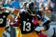 JACKSONVILLE, FL - OCTOBER 05: Roy Miller #97 of the Jacksonville Jaguars attempts to tackle Dri Archer #13 of the Pittsburgh Steelers during the game at EverBank Field on October 5, 2014 in Jacksonville, Florida. (Photo by Sam Greenwood/Getty Images)