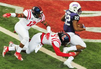 ATLANTA, GA - DECEMBER 31: Aaron Green #22 of the TCU Horned Frogs runs for a touchdown in the first quarter against the Ole Miss Rebels during the Chik-fil-A Peach Bowl at Georgia Dome on December 31, 2014 in Atlanta, Georgia. (Photo by Scott Cunningha