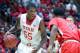 Nov 14, 2014; Salt Lake City, UT, USA; Utah Utes guard Delon Wright (55) dribbles the ball while defended by Ball State Cardinals guard Zavier Turner (1) during the second half at Jon M. Huntsman Center. Utah won 90-72. Mandatory Credit: Russ Isabella-USA