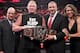 Lesnar with Paul Heyman and The Authority
