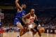 HOUSTON - JUNE 11: Clyde Drexler #22 of the Houston Rockets drives to the basket against Nick Anderson #25 of the Orlando Magic in Game Three of the 1995 NBA Finals at the Summit on June 11, 1995 in Houston, Texas. The Rockets won 106-103. NOTE TO USER