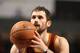 CHARLOTTE, NC - JANUARY 2: Kevin Love #0 of the Cleveland Cavaliers shoots a free throw against the Charlotte Hornets during the game at the Time Warner Cable Arena on January 2, 2015 in Charlotte, North Carolina. NOTE TO USER: User expressly acknowledge