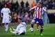 MADRID, SPAIN - JANUARY 07: Fernando Torres of Club Atletico de Madrid gets past Sergio Ramos of Real Madrid
during the Copa del Rey Round of 16, First Leg match between Club Atletico de Madrid and Real Madrid at Vicente Calderon Stadium on January 7, 20