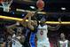 RALEIGH, NC - JANUARY 11: Jahlil Okafor #15 of the Duke Blue Devils battles Beejay Anya #21 and Abdul-Malik Abu #0 of the North Carolina State Wolfpack for a rebound during their game at PNC Arena on January 11, 2015 in Raleigh, North Carolina. North Caro