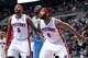 Feb 8, 2014; Auburn Hills, MI, USA; Detroit Pistons center Andre Drummond (0) and small forward Josh Smith (6) during the third quarter against the Denver Nuggets at The Palace of Auburn Hills. Pistons won 126-109. Mandatory Credit: Tim Fuller-USA TODAY S
