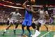 Jan 2, 2015; Boston, MA, USA; Dallas Mavericks guard Rajon Rondo (9) throws an over the head pass between Boston Celtics forward Brandon Bass (30) and Boston Celtics forward Jae Crowder (99) during the second quarter at TD Garden. Mandatory Credit: Winslo
