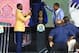 Aug 2, 2013; Canton, OH, USA; Minnesota Vikings former wide receiver Cris Carter and his son Duron Carter unveil Carter's bust during the 2013 Pro Football Hall of Fame Enshrinement at Fawcett Stadium. Mandatory Credit: Andrew Weber-USA TODAY Sports