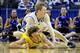 Kyle Singler hits the deck versus Michigan in 2011, just like his coach showed him.