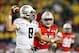 Jan 12, 2015; Arlington, TX, USA; Oregon Ducks quarterback Marcus Mariota (8) is pressured by Ohio State Buckeyes defensive lineman Joey Bosa (97) in the second half in the 2015 CFP National Championship Game at AT&T Stadium. Mandatory Credit: Matthew Emm