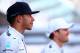 ABU DHABI, UNITED ARAB EMIRATES - NOVEMBER 23: Lewis Hamilton of Great Britain and Mercedes GP and Nico Rosberg of Germany and Mercedes GP attend a team photograph before the Abu Dhabi Formula One Grand Prix at Yas Marina Circuit on November 23, 2014 in