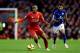 LIVERPOOL, ENGLAND - JANUARY 01: Raheem Sterling of Liverpool runs with the ball during the Barclays Premier League match between Liverpool and Leicester City at Anfield on January 1, 2015 in Liverpool, England. (Photo by Clive Brunskill/Getty Images)