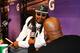 PHOENIX, AZ - JANUARY 27: Marshawn Lynch #24 of the Seattle Seahawks talks with NFL Network personality Deion Sanders at Super Bowl XLIX Media Day Fueled by Gatorade inside U.S. Airways Center on January 27, 2015 in Phoenix, Arizona. (Photo by Christian