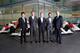 WOKING, ENGLAND- DECEMBER 10: In this handout photo provided by McLaren-Honda, Formula One drivers Fernando Alonso (2nd R) and Jenson Button (2nd L) pose as McLaren-Honda announces its new driver line-up for 2015 with Kevin Magnussen (C) who will remain a
