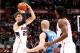 ATLANTA, GA - JANUARY 25: Kyle Korver #26 of the Atlanta Hawks against Chase Budinger #10 of the Minnesota Timberwolves at Philips Arena on January 25, 2015 in Atlanta, Georgia. NOTE TO USER: User expressly acknowledges and agrees that, by downloading a