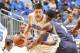 ORLANDO, FL - JANUARY 16: Nikola Vucevic #9 of the Orlando Magic handles the ball against Tony Allen #9 of the Memphis Grizzlies on January 16, 2015 at Amway Center in Orlando, Florida. NOTE TO USER: User expressly acknowledges and agrees that, by downlo