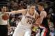 CLEVELAND, OH - JANUARY 28: Timofey Mozgov #20 of the Cleveland Cavaliers handles the ball against Meyers Leonard #11 of the Portland Trail Blazers on January 28, 2015 at Quicken Loans Arena in Cleveland, Ohio. NOTE TO USER: User expressly acknowledges a