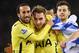 SHEFFIELD, ENGLAND - JANUARY 28: Christian Eriksen of Tottenham Hotspur celebrates with Andros Townsend (L) after the Capital One Cup Semi-Final Second Leg match between Sheffield United and Tottenham Hotspur at Bramall Lane on January 28, 2015 in Sheffi