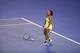 MELBOURNE, AUSTRALIA - JANUARY 31: Serena Williams of the United States reacts after a let when serving for the Championship in her women's final match against Maria Sharapova of Russia during day 13 of the 2015 Australian Open at Melbourne Park on Janua