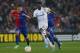 BASEL, SWITZERLAND - APRIL 11: Emmanuel Adebayor of Spurs runs past Aleksandar Dragovic of FC Basel (L) during the UEFA Europa League Quarter Final Second Leg match between FC Basel 1893 and Tottenham Hotspur at St. Jakob Park on April 11, 2013 in Basel,
