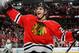 CHICAGO, IL - JANUARY 04: Brandon Saad #20 of the Chicago Blackhawks reacts after Patrick Sharp #10 (not pictured) scored the game winning goal against the Dallas Stars in overtime of the NHL game at the United Center on January 4, 2015 in Chicago, Illin