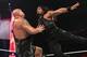 Roman Reigns flies at Big Show.