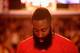 OAKLAND, CA - JANUARY 21: James Harden #13 of the Houston Rockets stands for the National Anthem before their game against the Golden State Warriors at ORACLE Arena on January 21, 2015 in Oakland, California. NOTE TO USER: User expressly acknowledges and