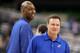 NEW ORLEANS, LA - MARCH 30: (R-L) Head coach Bill Self of the Kansas Jayhawks stands in front of assistant coach Danny Manning during practice prior to the 2012 Final Four of the NCAA Division I Men's Basketball Tournament at the Mercedes-Benz Superdome