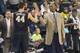 Nov 28, 2014; Winston-Salem, NC, USA; Wake Forest Demon Deacons head coach Danny Manning high fives forward Konstantinos Mitoglou (44) during the first half against the Delaware State Hornets at Lawrence Joel Veterans Memorial Coliseum. Mandatory Credit: