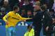LEICESTER, ENGLAND - FEBRUARY 07: Nigel Pearson, manager of Leicester City exchanges words with James McArthur of Crystal Palace during the Barclays Premier League match between Leicester City and Crystal Palace at the King Power Stadium on February 7, 2