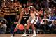 Jimmy Butler (right) became Buzz Williams' project at Marquette, bearing the brunt of the hardest practice drills and often the toughest defensive game assignments.