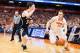 SYRACUSE, NY - FEBRUARY 3: Steve Vasturia #32 of the Notre Dame Fighting Irish defends against Trevor Cooney #10 of the Syracuse Orange as he drives towards the basket during the second half on February 3, 2014 at The Carrier Dome in Syracuse, New York.