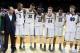 Jan 28, 2015; South Bend, IN, USA; Notre Dame Fighting Irish coach Mike Brey stands together with the team for the playing of the school song after defeating the Duke Blue Devils at Purcell Pavilion at the Joyce Center. Notre Dame defeats Duke 77-73. Mand