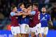 LEICESTER, ENGLAND - JANUARY 10: Ciaran Clark #6 of Aston Villa and Matthew James #'8 of Leicester City clash following a rash tackle on Jores Okore of Aston Villa during the Barclays Premier League match between Leicester City and Aston Villa at The Kin