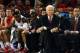 Nov 22, 2014; Charlotte, NC, USA; Davidson Wildcats Bob McKillop (center) looks on during the first half as his team plays against the North Carolina Tar Heels at Time Warner Cable Arena. Mandatory Credit: Rob Kinnan-USA Today.