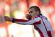 MADRID, SPAIN - JANUARY 03: Antoine Griezmann of Atletico de Madrid celebrates scoring their opening goal during the La Liga match between Club Atletico de Madrid and Levante UD at Vicente Calderon Stadium on January 3, 2015 in Madrid, Spain. (Photo by G