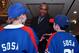 Cubs manager Dusty Baker with Sammy Sosa fans in 2003.
