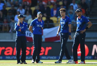 WELLINGTON, NEW ZEALAND - FEBRUARY 20: England captain Eoin Morgan talks with bowlers James Anderson, Steven Finn and Stuart Broad during the 2015 ICC Cricket World Cup match between England and New Zealand at Wellington Regional Stadium on February 20,