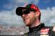 DAYTONA BEACH, FL - FEBRUARY 22: Regan Smith, driver of the #41 Haas Automation Chevrolet, looks on from the grid prior to the NASCAR Sprint Cup Series 57th Annual Daytona 500 at Daytona International Speedway on February 22, 2015 in Daytona Beach, Flori