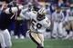 8 Oct 2000: Keith Mitchell #59 of the New Orleans Saints goes head to head against James WIlliams #71 of the Chicago Bears during the game at Soldier Field in Chicago, Illinois. The Saints defeated the Bears 31-10.Mandatory Credit: Jonathan Daniel /Alls