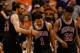 PHOENIX, AZ - JANUARY 30: Joakim Noah #13, Derrick Rose #1 and Jimmy Butler #21 of the Chicago Bulls react during the second half of the NBA game against the Phoenix Suns at US Airways Center on January 30, 2015 in Phoenix, Arizona. The Suns defeated the