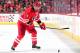 RALEIGH, NC - FEBRUARY 24: Andrej Sekera #4 of the Carolina Hurricanes looks for passing options before releasing the puck during an NHL game against the Philadelphia Flyers on February 24, 2015 at PNC Arena in Raleigh, North Carolina. (Photo by Gregg Fo