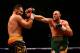 LONDON, ENGLAND - FEBRUARY 28: Tyson Fury (green shorts) on his way to victory over Christian Hammer in a Heavyweight Contest by singing 'Elvis' at the O2 Arena on February 28, 2015 in London, England. (Photo by Richard Heathcote/Getty Images)