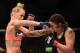 LOS ANGELES, CA - FEBRUARY 28: (L-R) Holly Holms and Raquel Pennington exchange punches in their women's bantamweight bout during the UFC 184 event at Staples Center on February 28, 2015 in Los Angeles, California. (Photo by Harry How/Getty Images)