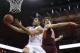 Feb 28, 2015; Charlottesville, VA, USA; Virginia Cavaliers guard Malcolm Brogdon (15) shoots the ball as Virginia Tech Hokies forward Satchel Pierce (21) defends in the second half at John Paul Jones Arena. The Cavaliers won 69-57. Mandatory Credit: Geoff
