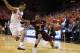 Feb 28, 2015; Charlottesville, VA, USA; Virginia Tech Hokies guard Adam Smith (3) dribbles the ball as Virginia Cavaliers guard Malcolm Brogdon (15) defends in the first half at John Paul Jones Arena. Mandatory Credit: Geoff Burke-USA TODAY Sports
