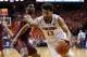 Feb 28, 2015; Charlottesville, VA, USA; Virginia Cavaliers forward Anthony Gill (13) dribbles the ball as Virginia Tech Hokies guard Ahmed Hill (13) defends in the second half at John Paul Jones Arena. The Cavaliers won 69-57. Mandatory Credit: Geoff Burk