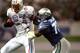 29 Nov 1998: Running back Eddie George #27 of the Tennessee Oilers in action against defensive end Michael Sinclair #70 of the Seattle Seahawks during a game at the Kingdome in Seattle, Washington. The Seahawks defeated the Oilers 20-18. Mandatory Credit